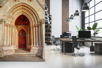 Pointed arch wall mural with Deep red door with ornate iron scrollwork in office., GD10451