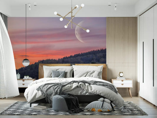 Twilight forest and crescent moon wall mural in a bedroom with forest canopy.