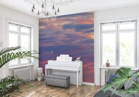 Dusk wall mural with Purple and violet cloud layers with warm light patches., GD10453