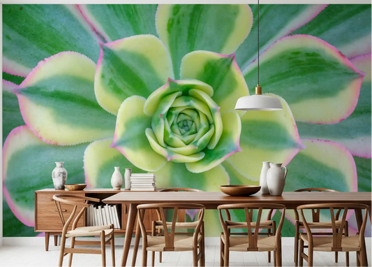 Variegated succulent mural with radial leaf pattern in a dining room.