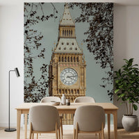 City wall mural with Tree leaves and branches framing golden clock tower in dining room., GD10461