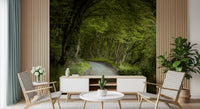 Enchanted pathway mural with Natural tree tunnel with layered shadows.