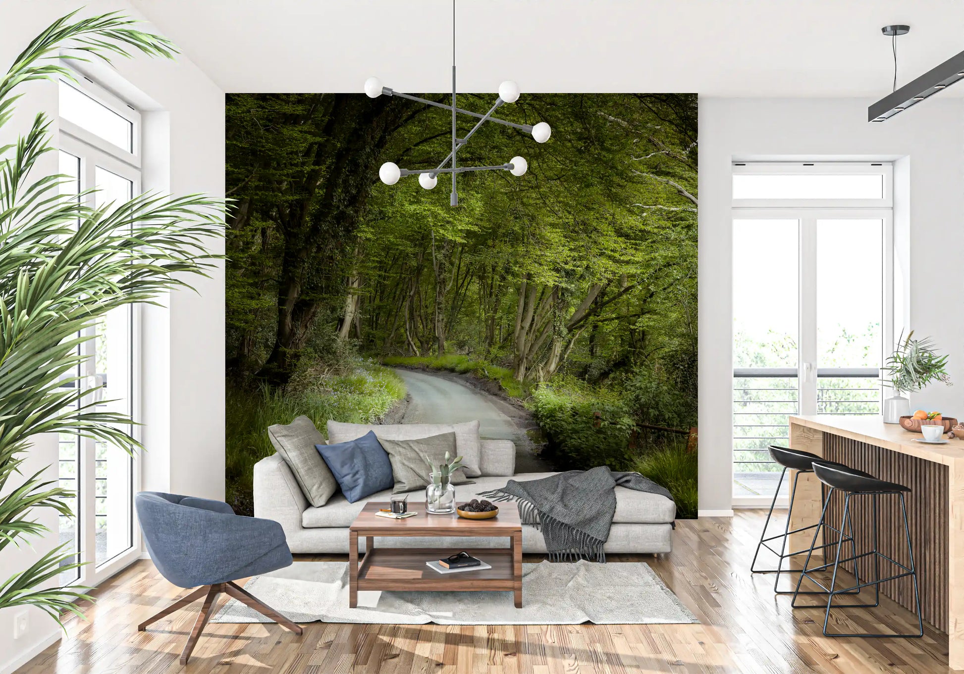 Deep green woodland canopy over winding road in forest wall mural.