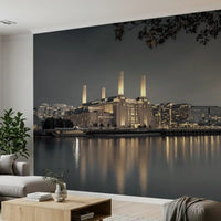 Twilight wall mural showing industrial architecture with golden lit chimneys., GD10468