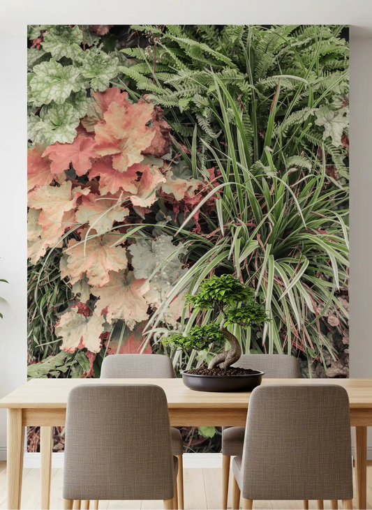 Muted garden layers wall mural with fern detail in a dining room.