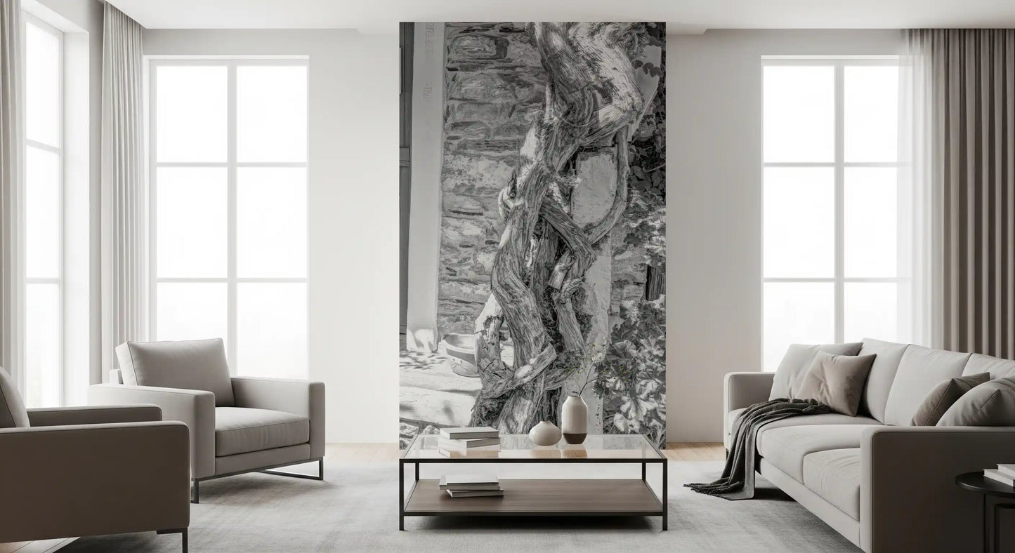 Gnarled twisted tree trunk beside the doorway in village entry wall mural., GD10494