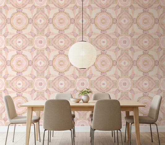 Peach toned kaleidoscope wallpaper for a dining room wall with mandala pattern.