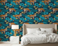 Tiger and lotus pond wallpaper adding bold colour to a bedroom.