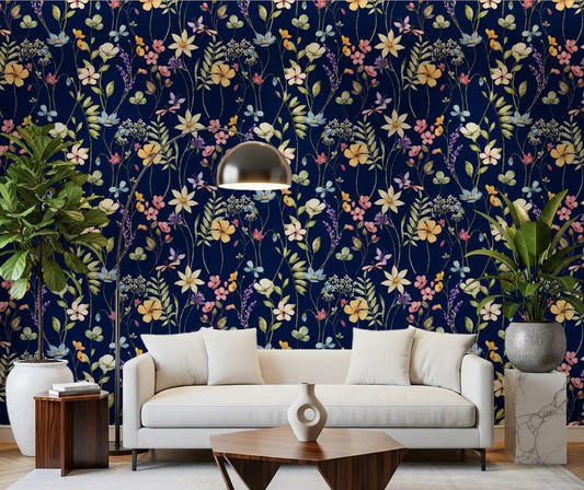 Dark botanical garden wallpaper for living room in deep navy and pastel tones.