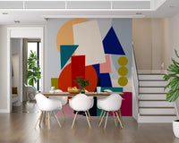 Multicolour abstract wall mural with burnt orange circle and navy triangles in dining area., GD10551