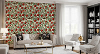 Crimson pomegranate fruit wallpaper with scattered butterfly motifs on cream base.