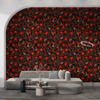 Pomegranate branch wallpaper with charcoal brown leaves on black backdrop.