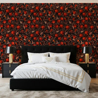 Crimson pomegranate wallpaper with muted brown leaves and dark foliage in bedroom.