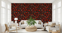 Dark botanical wallpaper with red pomegranates and orange-winged butterflies.