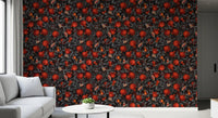 Crimson pomegranate wallpaper with red fruits on dark branches and black background.