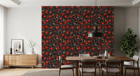 Botanical repeat pattern wallpaper with pomegranates and moths in dining area.