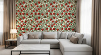 Botanical pomegranate wallpaper with dense green foliage and ripe red fruits.
