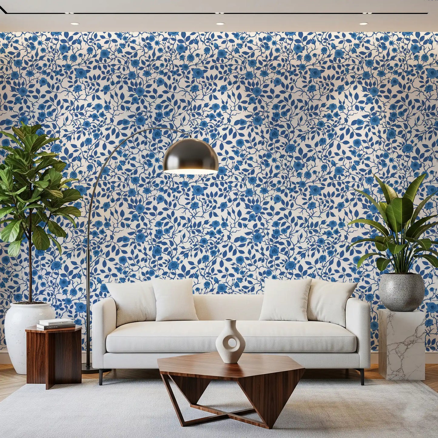Blue floral vine wallpaper with large blooms and small rose buds.