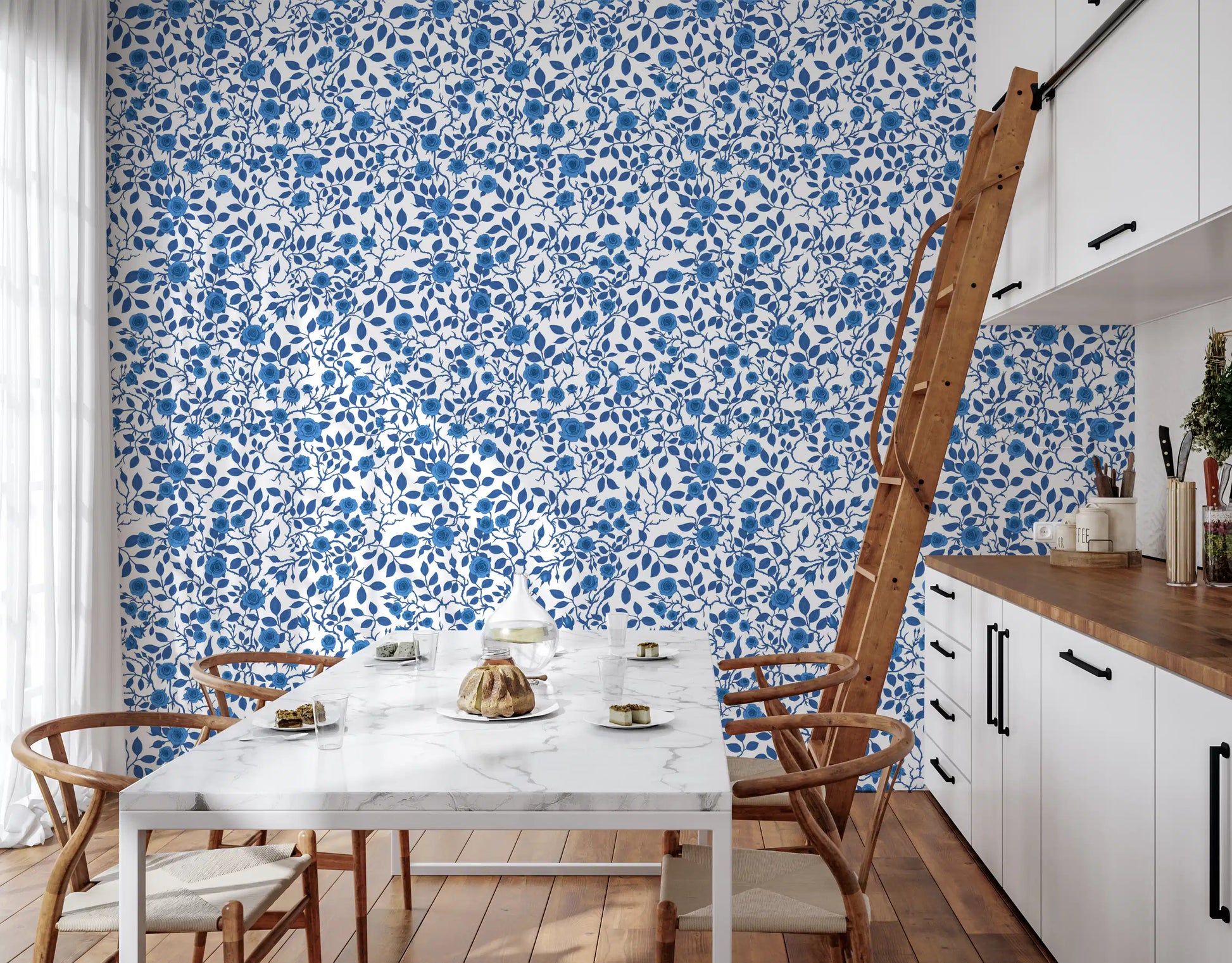 Blue and white wallpaper with trailing rose branches and thorn details.