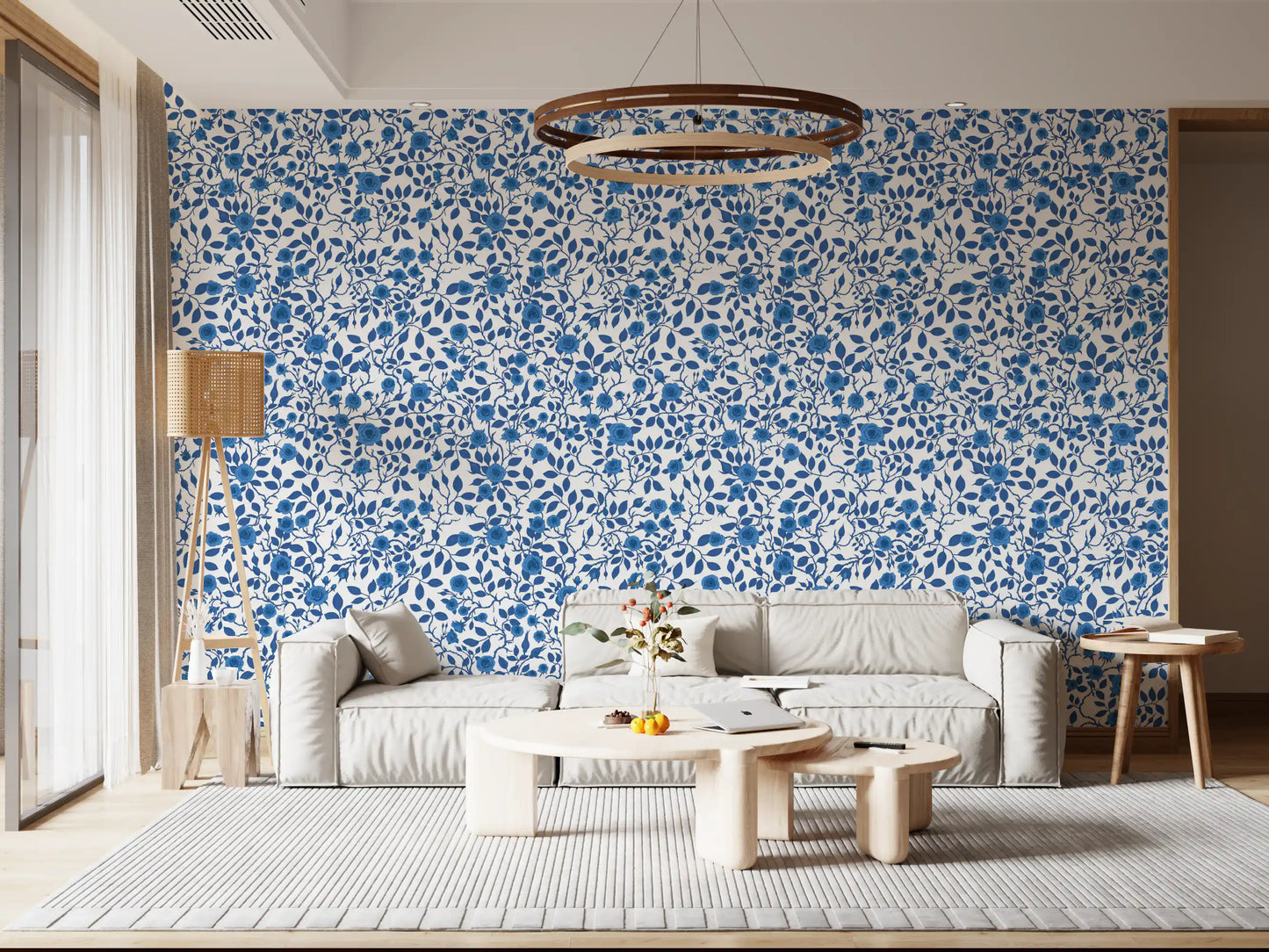 Monochrome blue wallpaper with climbing rose vines and tight buds.
