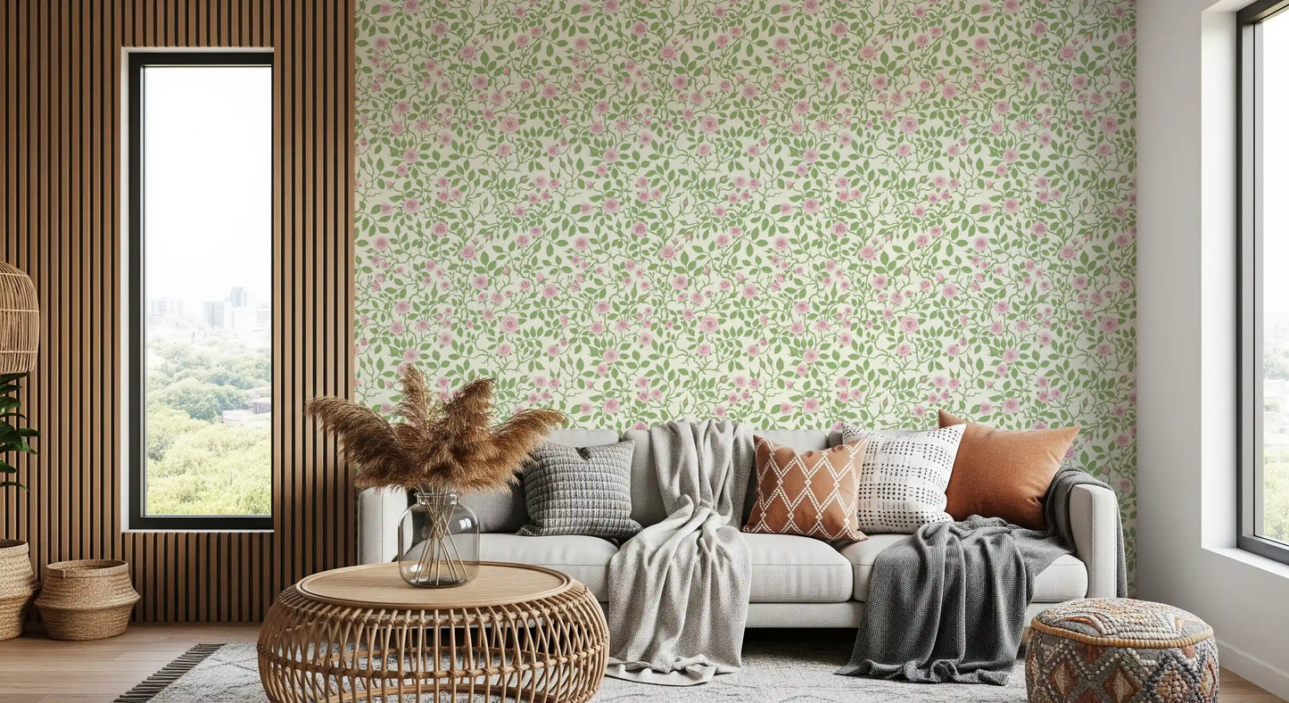 Floral vine pattern wallpaper with blush pink roses and green thorny stems.