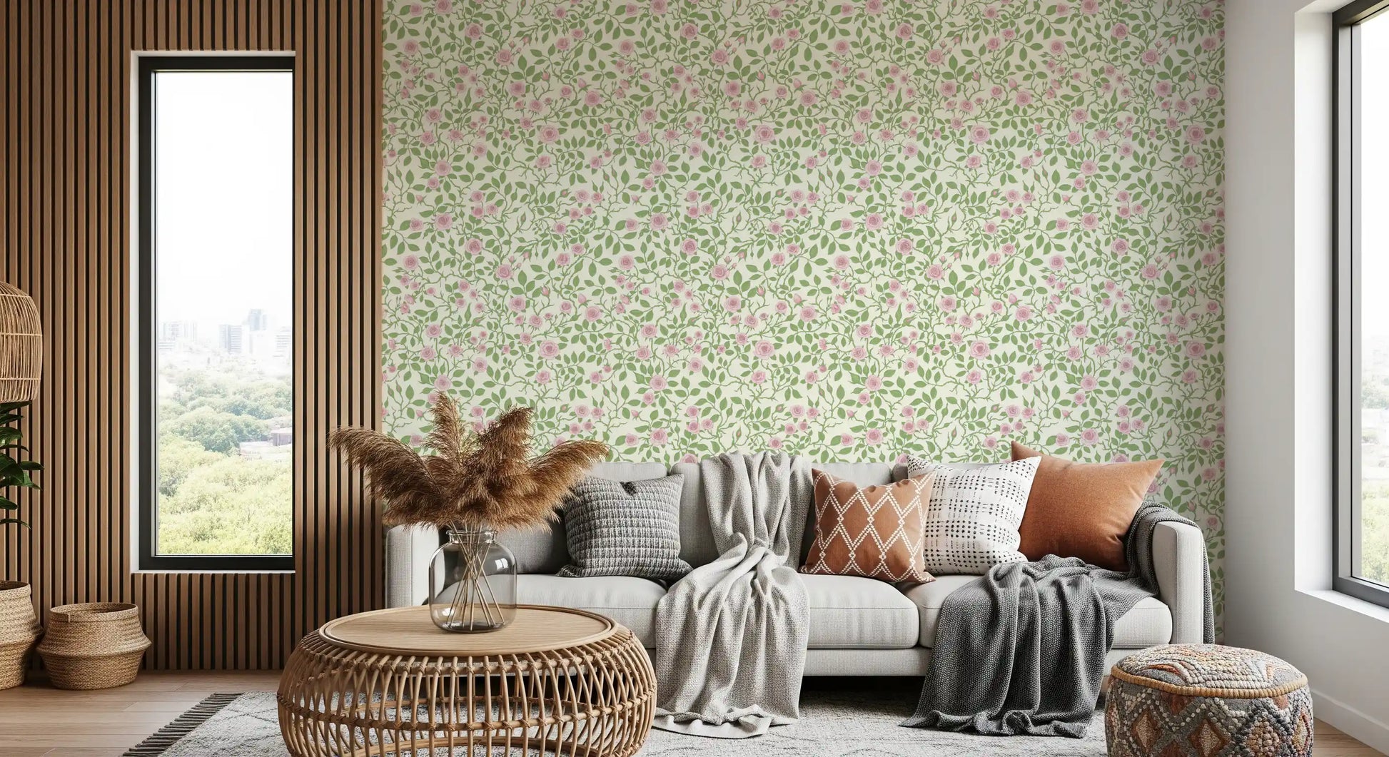 Floral vine pattern wallpaper with blush pink roses and green thorny stems.
