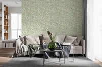Living room wallpaper with soft pink roses and sage green leaves on pale base.