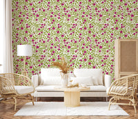 Blooming rose trellis wallpaper with lime green leaves on cream.