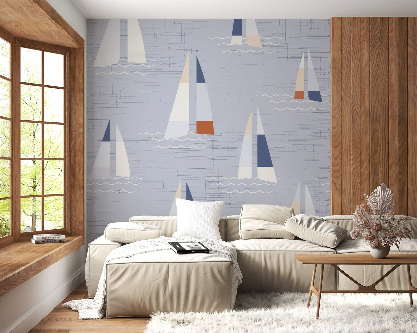 Light blue sailboat wall mural with rust and peach colour block accents in living area.