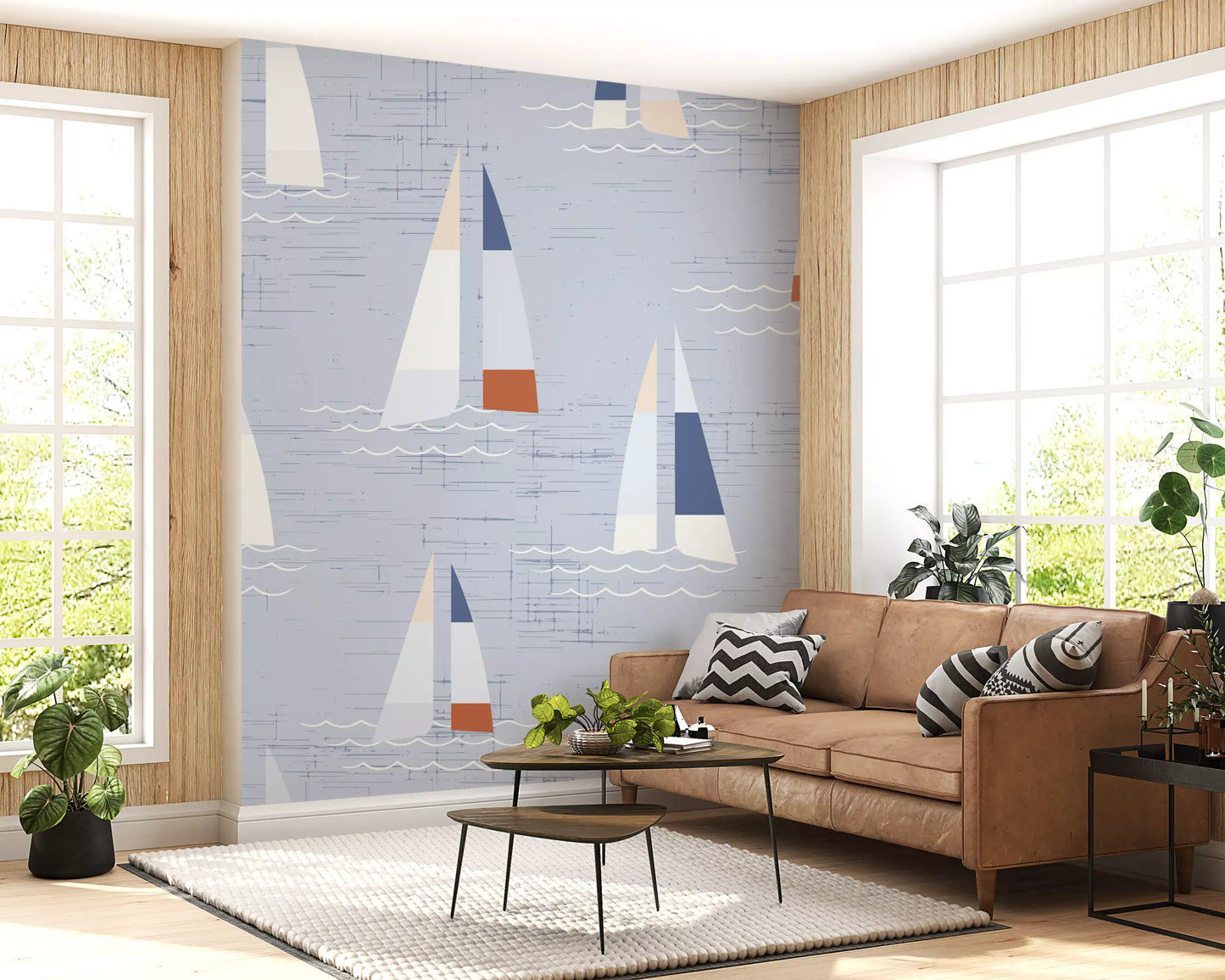 Sailboat wall mural with white and navy triangular sails on blue ground.