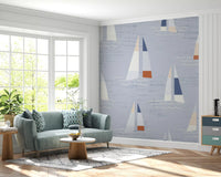 Wall mural showing mid century sailboat on coastal blue ground.