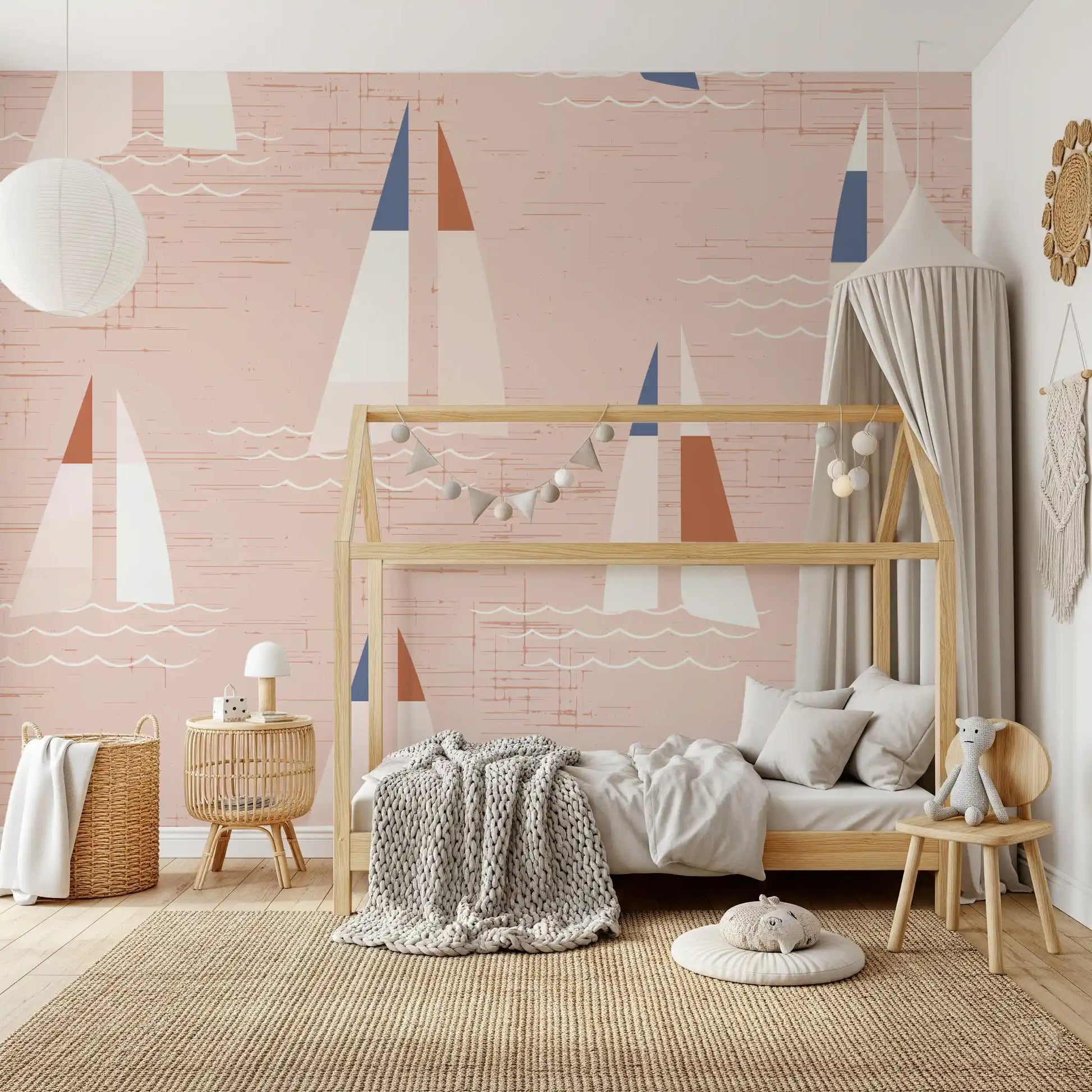 Kids room nautical sailboat wall mural in soft peach with wave details.