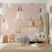Kids room nautical sailboat wall mural in soft peach with wave details.