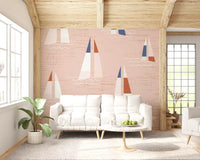 Nautical wave and sailboat wall mural in peach with multi-toned sails.