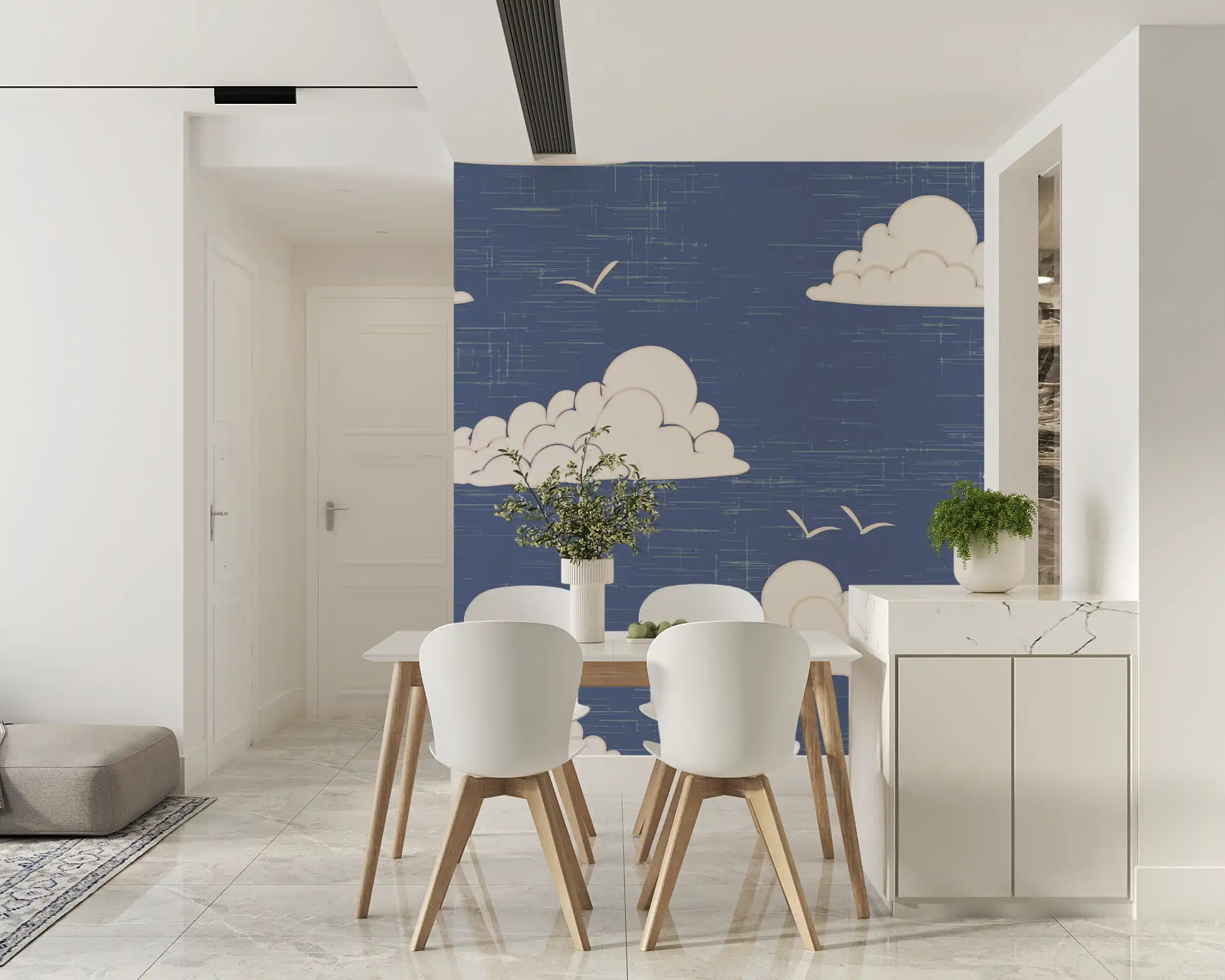 Small and large clouds scattered across dusty blue wall mural.