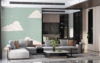 Living room interior with mid century light sage cloud sky wall mural.