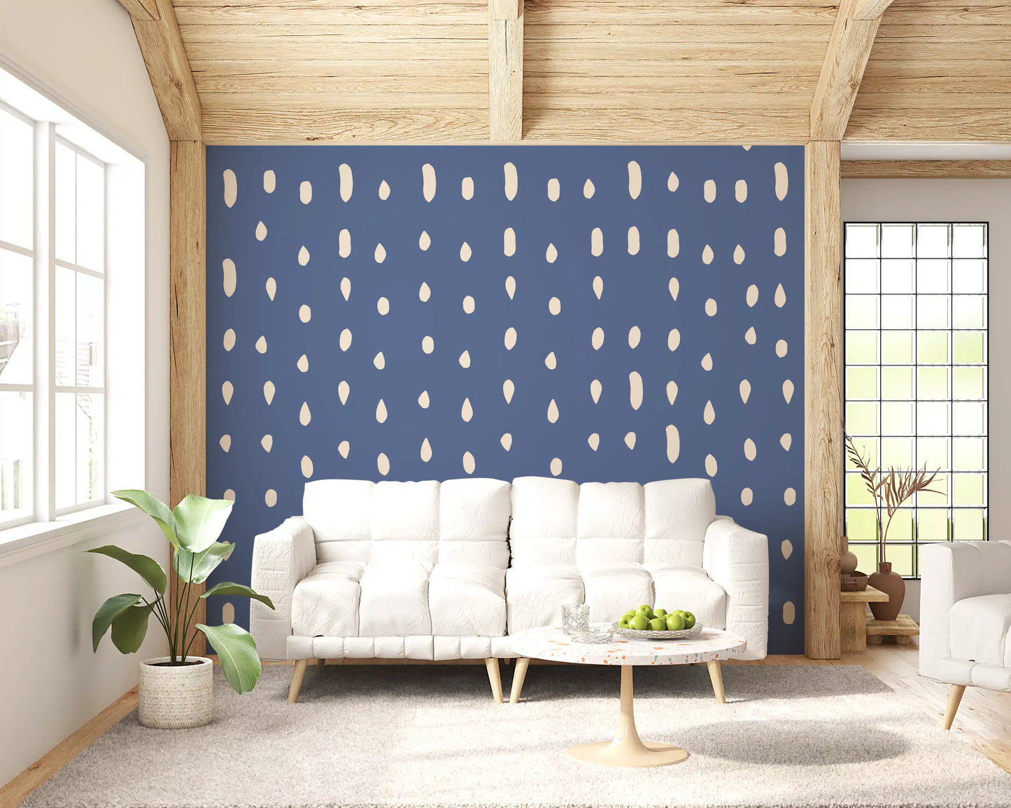 Cream seed-shaped dots scattered across dusty blue wall mural.
