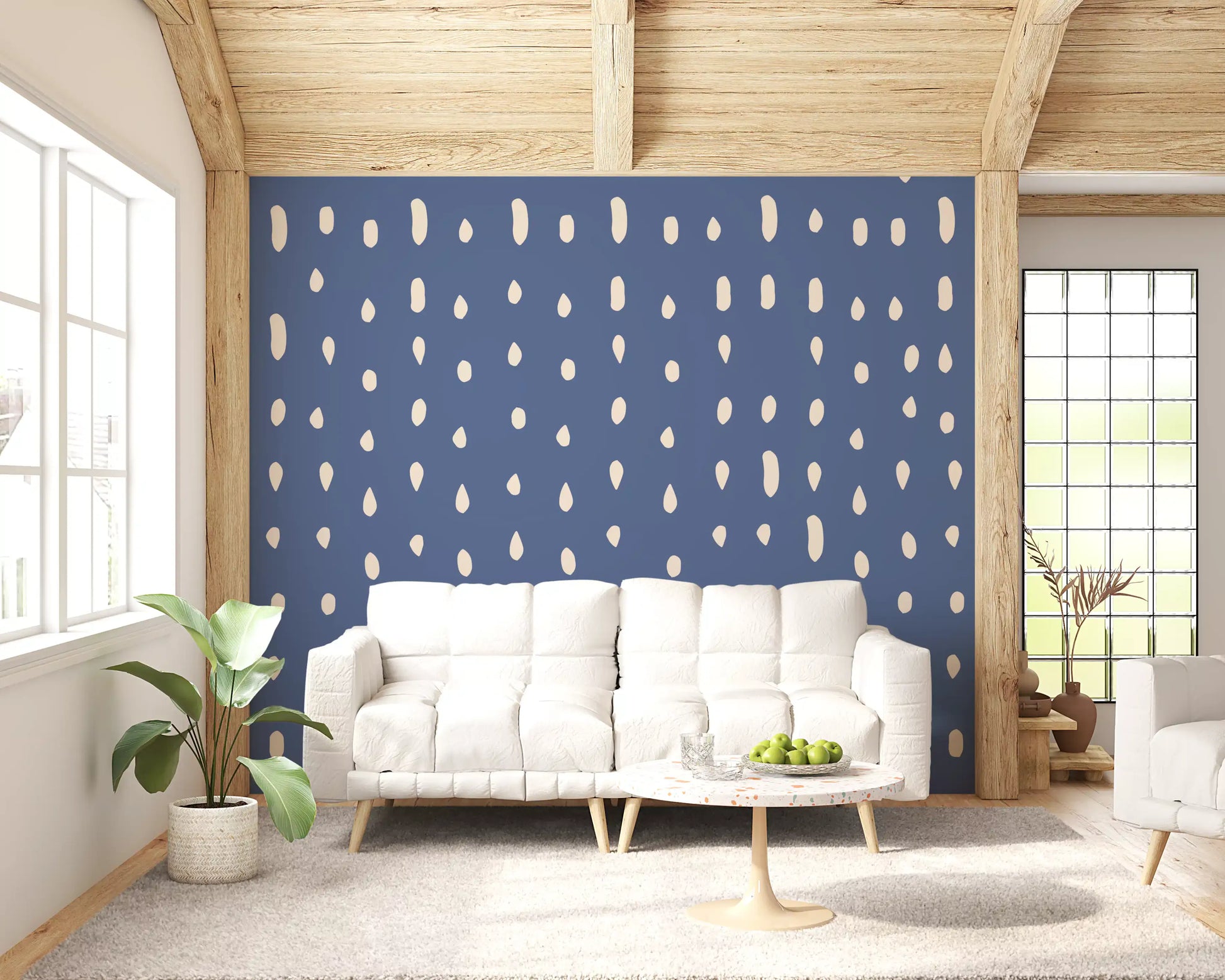 Cream seed-shaped dots scattered across dusty blue wall mural.