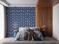 Dusty blue and cream seed dot wall mural in bedroom.