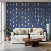 Living room with mid century seed dots dusty blue wall mural.