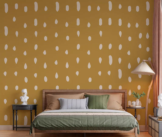 Bedroom interior covered in mustard seed dot pattern wall mural.