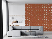 Terracotta wall mural with uneven cream seed dot spacing., GD10573