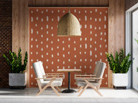 Mid-century organic dot pattern on terracotta wall mural., GD10573