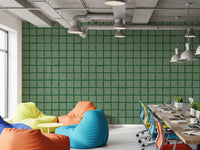 Office wall showing olive green wavy grid wallpaper pattern.
