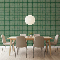 Olive green wavy grid wallpaper in a modern dining room setting.