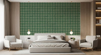 Mid century wallpaper with loose freeform grid in olive green in bedroom.