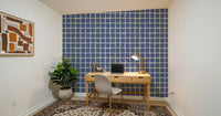Mid century wallpaper with freeform grid in dusty blue.