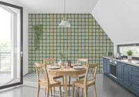 Soft sage wavy grid wallpaper in a modern dining room setting.