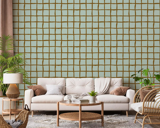 Mid century sage and brown grid wallpaper in a living room.