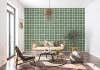 Tonal sage green wavy grid wallpaper with crisp white lines.